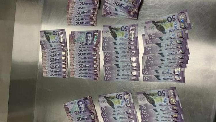 A large quantity of cash the scammers attempted to leave with